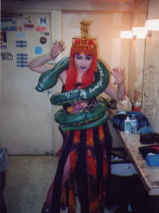mistress amrita singer amrita magenta cleopatra python dress red wig backstage