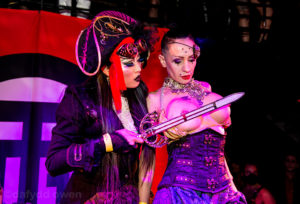 mistress amrita pirate steampunk fetish party bondage sword performance