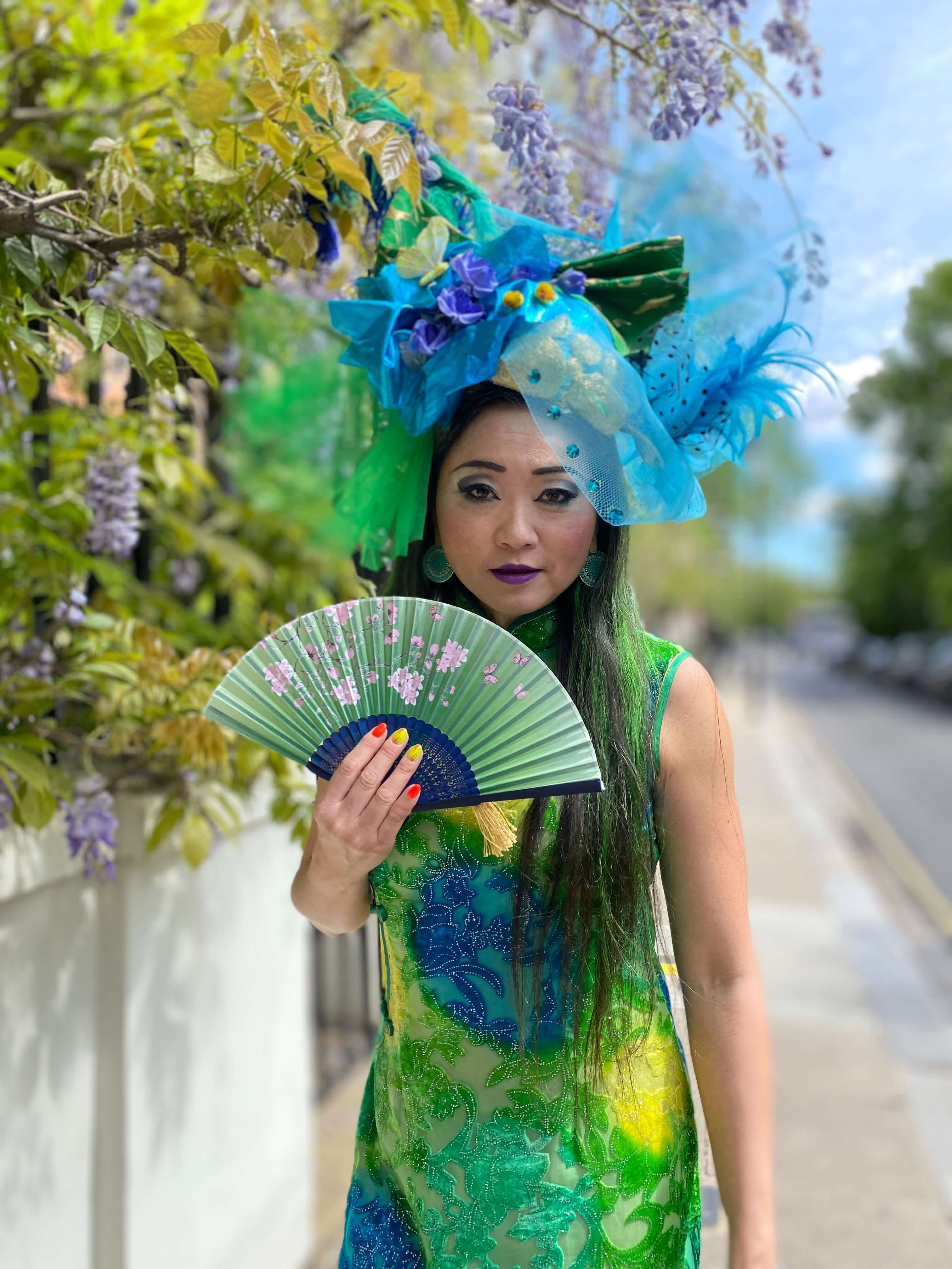 international japanese mistress amrita wearing a colorful asian dress